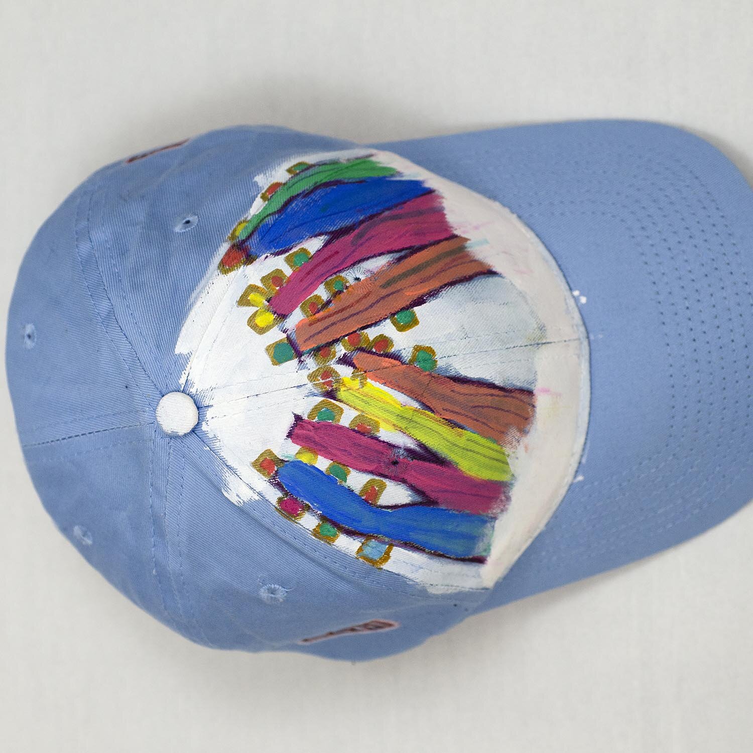 Blue Baseball Cap with hand painted Winter Trees by Mike Hinchcliff