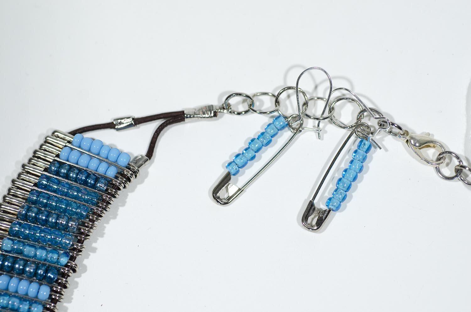 Blue Beaded Safety Pin Necklace and Earrings by Claire Nedzela